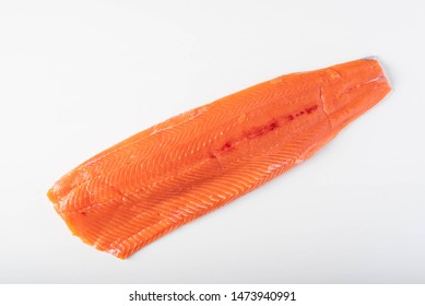 Isolated Whole Raw Salmon Fillet On White Background