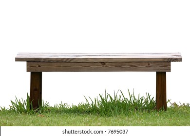 Isolated Wood Bench On Green Grass.