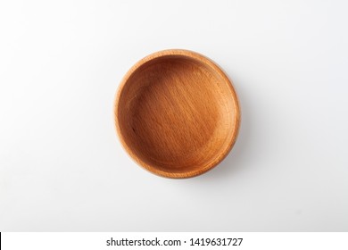 Isolated wooden bowl on white background