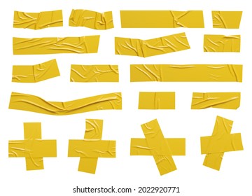 Isolated wrinkled yellow adhesive tape pieces. - Shutterstock ID 2022920771