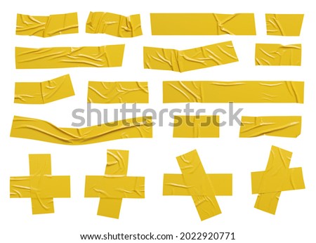 Isolated wrinkled yellow adhesive tape pieces.