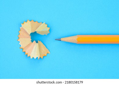 Isolated Yellow Pencil And Pencil Shavings.