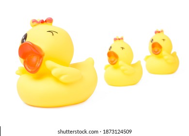 Isolated Yellow Rubber Duck. Collection Of Yellow Rubber Ducks Family On White Background. It Is A Toy For Children. Clipping Path.