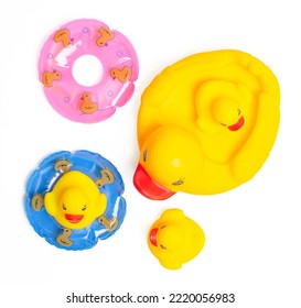 Isolated Yellow Rubber Duck. Top View Collection Of Yellow Rubber Ducks Family On White Background. It Is A Toy For Children. Clipping Path.