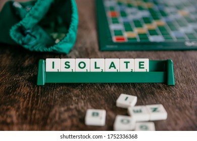 Isolation during the Covid-19 coronavirus pandemic and entertainment at home. Isolate inscription made of letters from the game