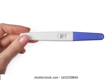 Isolation Of Positive Pregnancy Test Stick In Woman Hand, Surprise