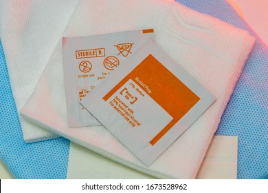 Isopropyl Alcohol Wipes On Top Of Dressing Gauze