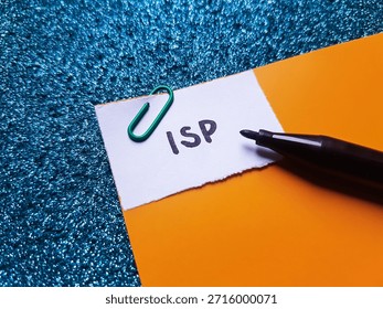 ISP writting on table background. 