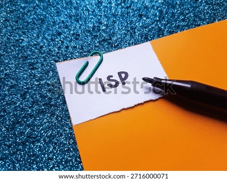 ISP writting on table background. 
