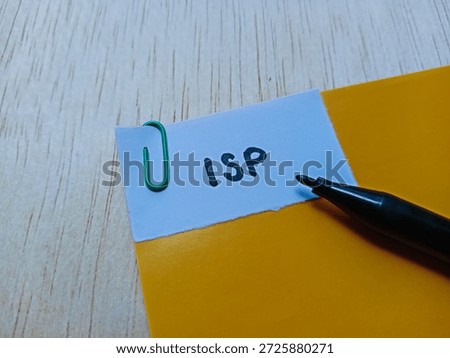 ISP writting on table background. 