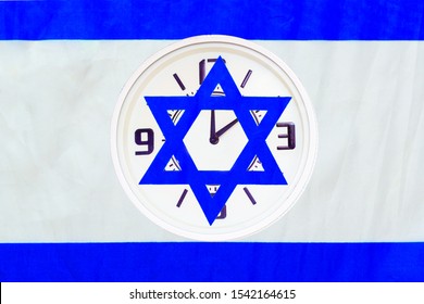 Israel Daylight Saving Time Started Or Ended. Clock With Israeli Flag.