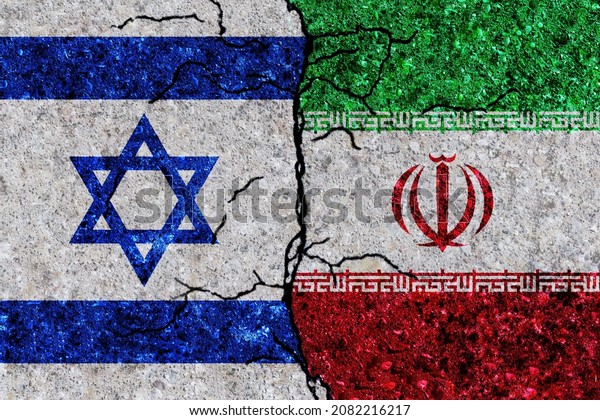 Israel and Iran painted flags on a wall with\
grunge texture. Israel and Iran conflict. Iran and Israel flags\
together. Iran vs Israel