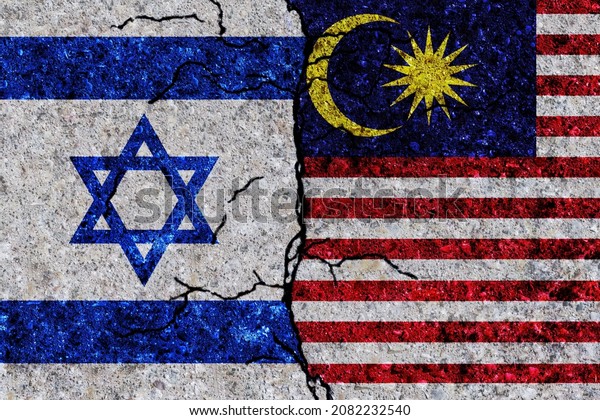 Israel and Malaysia painted flags on a wall\
with grunge texture. Israel and Malaysia conflict. Malaysia and\
Israel flags together. Malaysia vs\
Israel