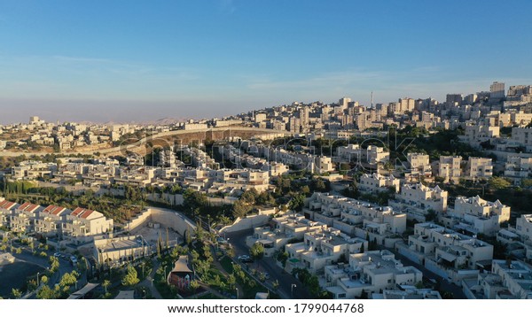 Israel and Palestine\
town divided by wall, aerial\
pisgat zeev and anata refugees camp,\
Jerusalm israel\
