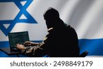 Israel secret police agent uses mass propaganda tools on laptop to influence population minds, engaging in psychological operations. Mossad Israeli spy commits PsyOp sabotage using device, camera A