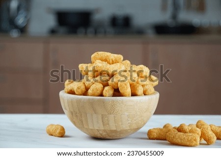 Israeli famous snack Bamba - made of peanut butter. Peanut Flips or peanut puffs