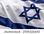 Israeli flag blowing in the wind - Close up.