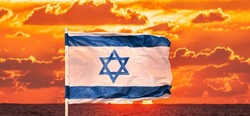 
Israeli Flag With Sky With Red Clouds In The Background - October 10, 2023 Tel Aviv Israel
