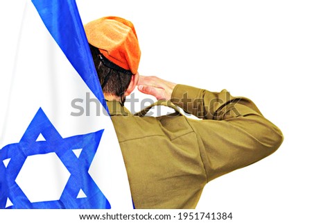 Israeli soldier salutes. Israel flag behind the back. White isolated background