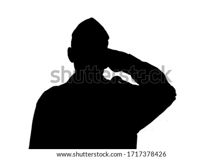 Israeli soldier silhouette (Israel Defense Forces, IDF) salutes on white isolated background.  Soldier in army Tzahal uniform with a beret on his head