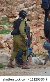 Israeli Soldiers Arrest Protesters During The Friday Protests, Nabi Saleh, West Bank, Palestine.
14/03/15