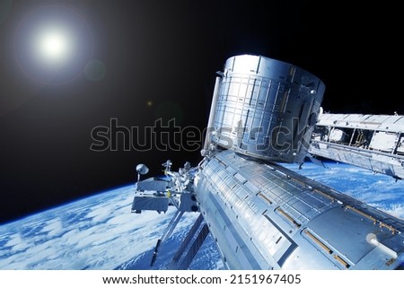 Iss over the planet Earth. Elements of this image furnished by NASA. High quality photo
