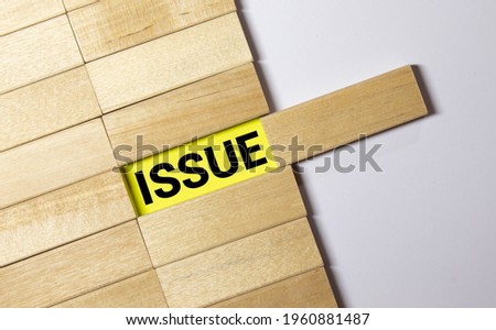 Issue word on wooden cubes. Issue concept.