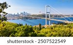 Istanbul Bosphorus Bridge or 15th July Martyrs Bridge with Istanbul panorama cityscape during summer sunny day. Istanbul, Turkiye