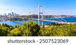 Istanbul Bosphorus Bridge or 15th July Martyrs Bridge with Istanbul panorama cityscape during summer sunny day. Istanbul, Turkiye