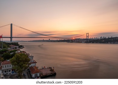 Istanbul Bosphorus Bridge at sunset. 15 July Martyrs Bridge. Sunset view from Beylerbeyi. Istanbul, Turkey Long Exposure. - Powered by Shutterstock