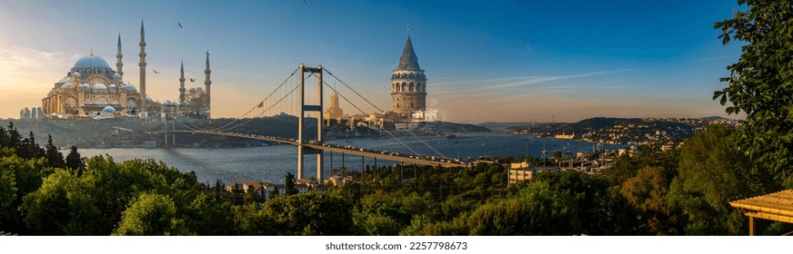 Istanbul Bosphorus panoramic photo. Istanbul landscape beautiful sunset with clouds Suleymaniye mosque and Galata Tower double exposure, Bosphorus Bridge,  Istanbul Turkey.