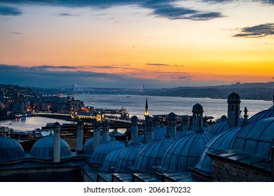 Istanbul Bosphorus sunset amazing landscape from Suleymaniye in evening. silhouette of steamship,dome, mosque and bridge at perfect sunset. - Shutterstock ID 2066170232