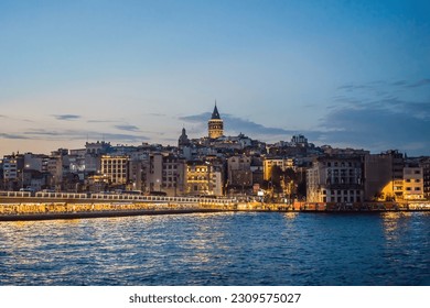 Istanbul city skyline in Turkey, Beyoglu district old houses with Galata tower on top, view from the Golden Horn - Powered by Shutterstock