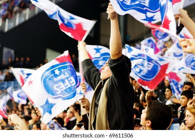 ISTANBUL - JANUARY 20: Efes Pilsen Supporters Cheer Their Team During THY Euroleage Top 16 Championship Basketball Game Efes Pilsen Vs Montepaschi Siena January 20, 2011 In Istanbul