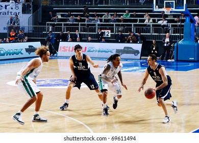 ISTANBUL - JANUARY 20: Igor Rakocevic (8) In Action Against David Moss (34) At THY Euroleage Top 16 Championship Basketball Game Efes Pilsen Vs Montepaschi Siena January 20, 2011 In Istanbul