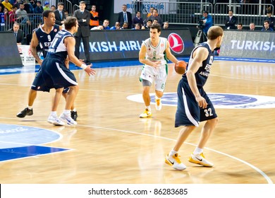 ISTANBUL - JANUARY 20: Nikolaos Zisis (6) Looks To Drive As Efes Defence During Euroleage Top 16 Championship Basketball Game Efes Pilsen Vs Montepaschi Siena January 20, 2011 In Istanbul