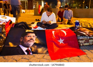 ISTANBUL - JULY 27: People Gathered In Taksim Square To Support Egypt's Ex-President Mohamed Morsi In Turkey On July 27, 2013 In Istanbul, Turkey.