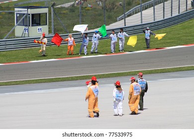 ISTANBUL - MAY 08: Istanbul Park Staff Wave Flags After GP2 Series Race 2, Istanbul Park On May 08, 2011 Istanbul, Turkey