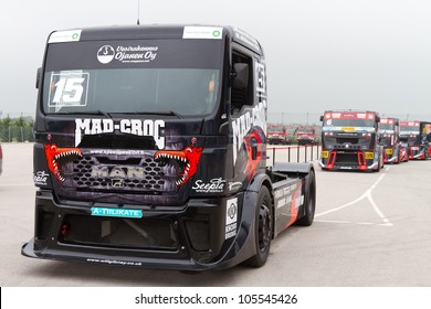 ISTANBUL - MAY 13: Mika Makinen of MAN Mad-Croc Truck Racing team and other racers are waiting for Super Pole of 2012 FIA European Truck Racing Championship on May 13, 2012 in Istanbul, Turkey.