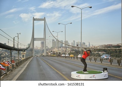 ISTANBUL, November 5, 2013: Tiger Woods playing golf on Bosphorus Bridge which connects Europe and Asia continents by motorway in Istanbul, Turkey, November 5, 2013.