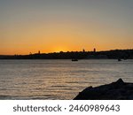 Istanbul sunset interesting different wonderful panoramic views sky red city silhouette sea buildings tourism travel sightseeing holiday buying now.