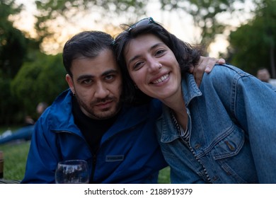 Istanbul, Turkey- 06.25.2022 : Young Couple At Park. Angry, Moody Man And Happy, Smiling Woman.