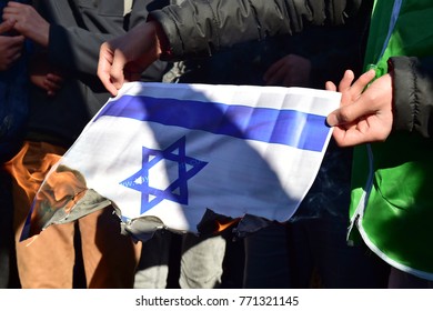 Istanbul, Turkey, 08 December 2017: Protestors Burn Israeli Flag And Shout Slogans Against US President Donald Trump During A Protest Against The Israel And US At Fatih Mosque After Friday Prayer