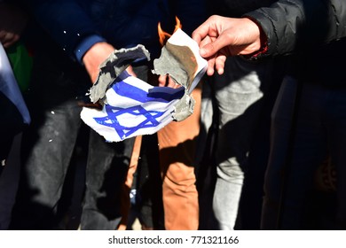 Istanbul, Turkey, 08 December 2017: Protestors Burn Israeli Flag And Shout Slogans Against US President Donald Trump During A Protest Against The Israel And US At Fatih Mosque After Friday Prayer