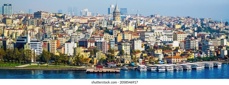 Istanbul, Turkey, 11.10.2020. Istanbul Panorama. View From Asian Part Of The City. Galata Tower Rises Above The Houses. Golden Horn Waterway And The Primary Inlet Of The Bosphorus. Ferries On Water.