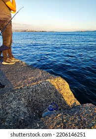 Istanbul, Turkey 24 September 2022: Fishing With A Fishing Rod In The Rough Sea