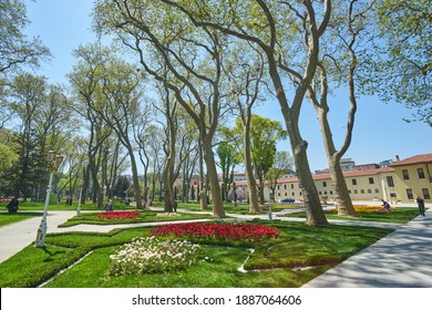 Istanbul, Turkey - April, 23, 2018, Annual Spring Festival of Tulips new design Gulhane Park, local people and tourists are getting rest, making photos, slice of life, editorial. - Shutterstock ID 1887064606