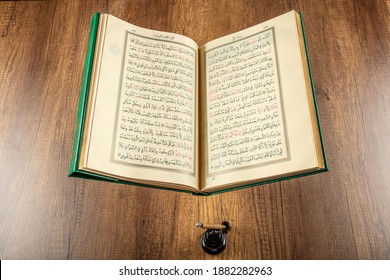 Istanbul, Turkey - April 5, 2015; A Quran book opened with a rosary. Quran - holy book of innocent Muslims (breadth of all Muslims).