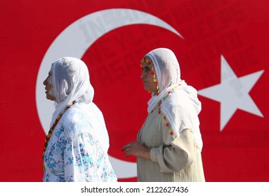 Istanbul, Turkey: August 15, 2019: Two Kurdish Women Are Walking In Front Of The Turkish Flag.