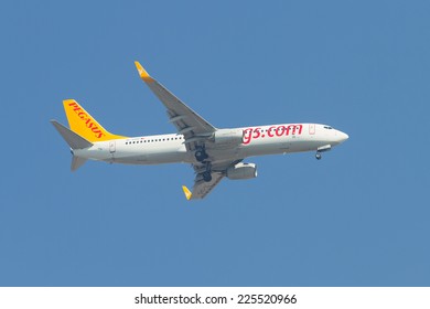 ISTANBUL, TURKEY - AUGUST 16, 2014: Pegasus Airlines Boeing 737-800 landing to Sabiha Gokcen Airport. Pegasus is the second largest airlines in Turkey with 54 airplanes.